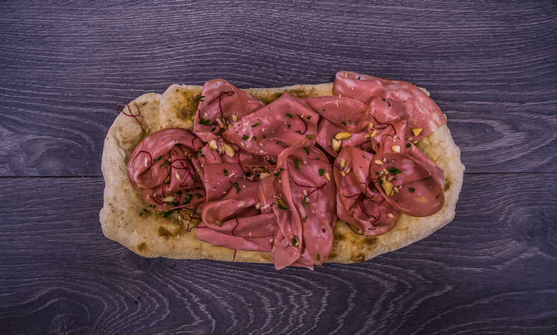 Pinsa Romana with Mortadella and Pistachios